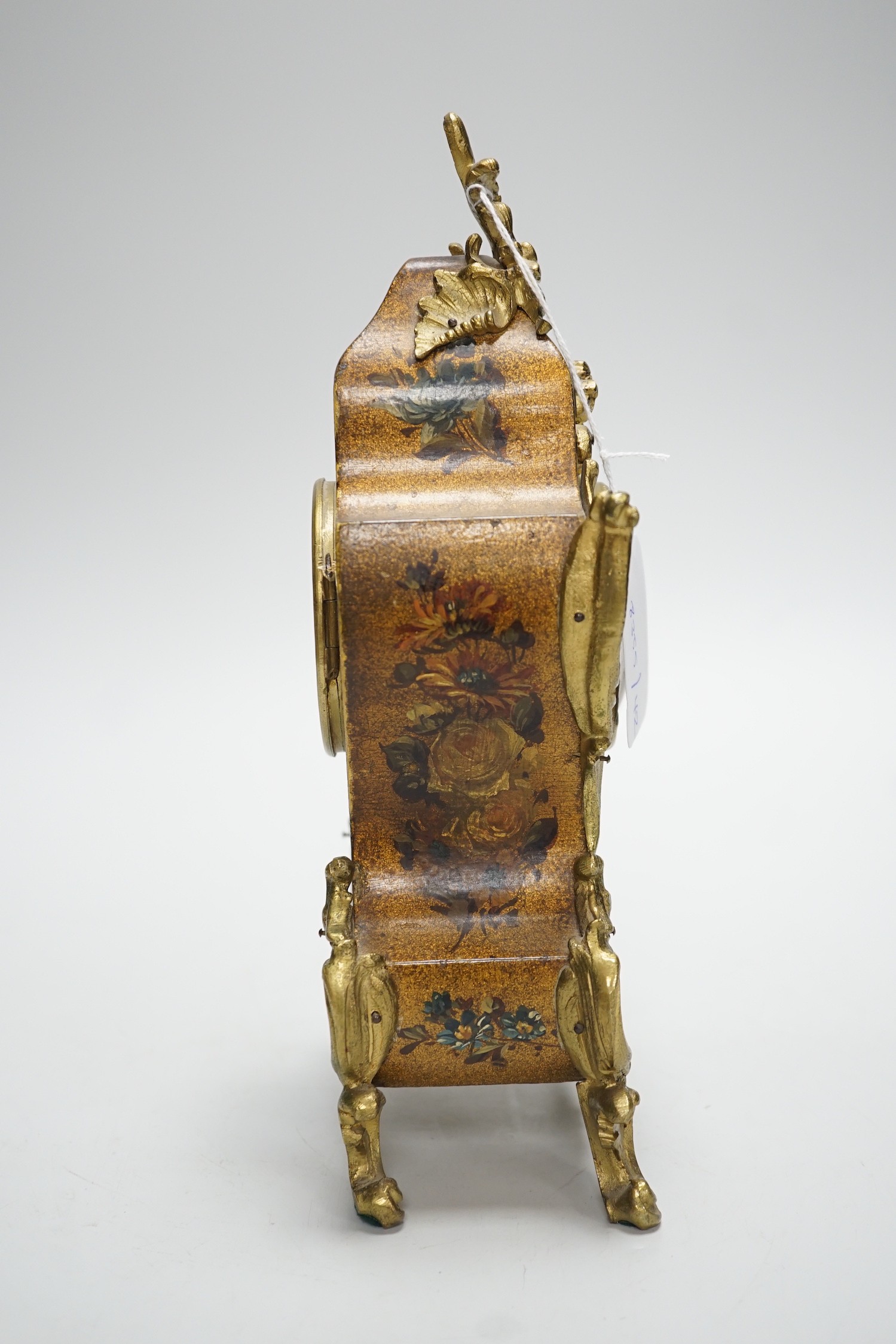 An early 20th century French gilt metal mounted painted mantel timepiece, 25cm